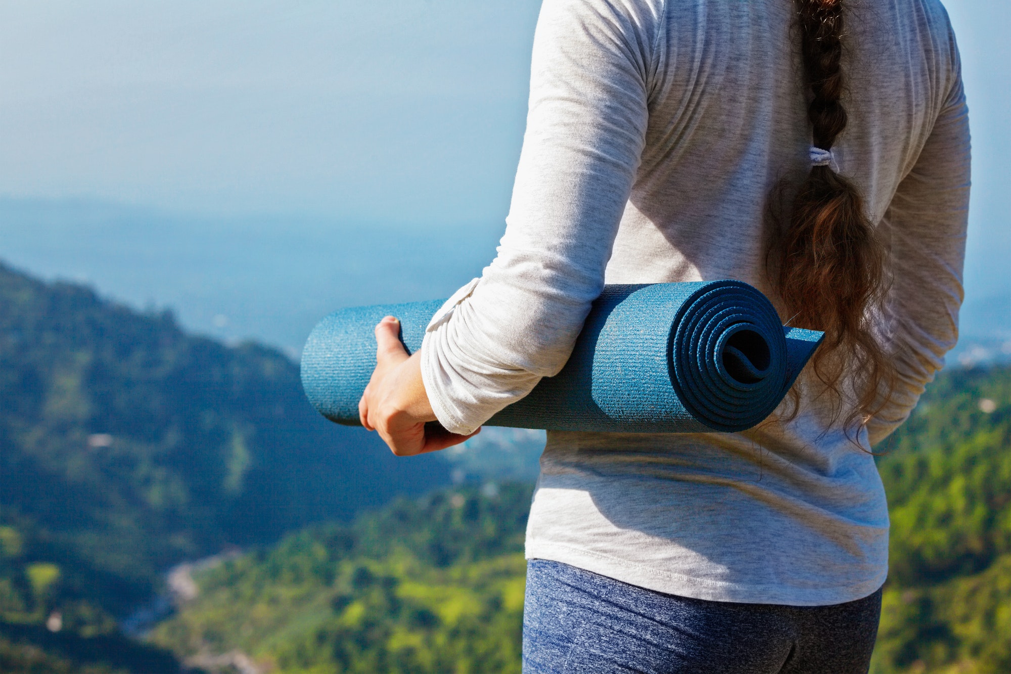Woman standing with yoga